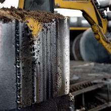 Powder Coating Resistance to Mud, Oil, and Grease in Heavy Equipment